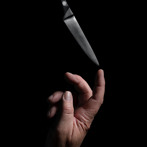 mano y cuchillo.